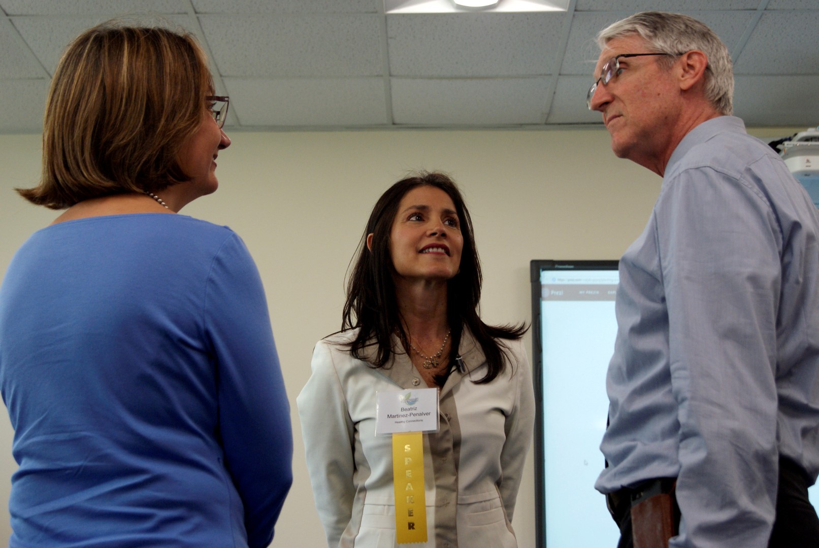 Beatriz speaking with James