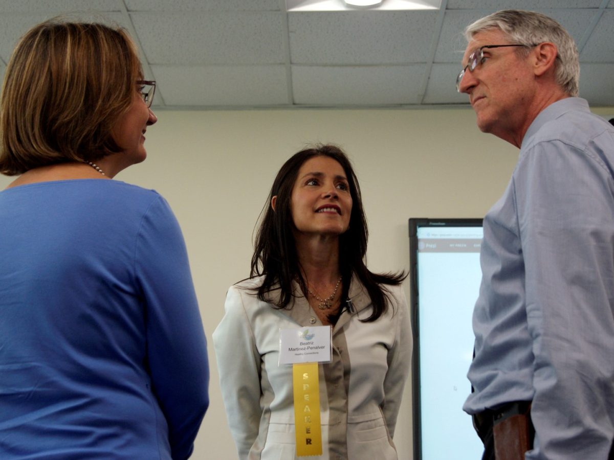 Beatriz speaking with James